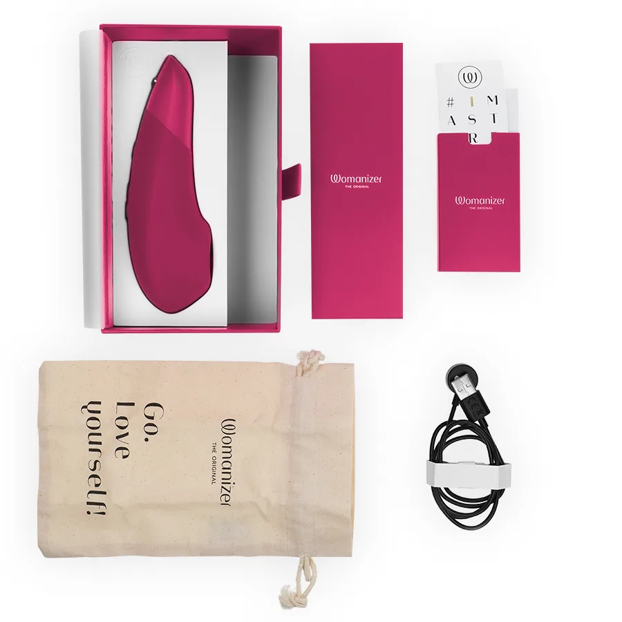WOMANIZER - Estimulador Clitoriano Enhance Rosa Vibrante